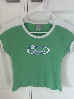 Women’s small green Jones and Mitchell tshirt with graphic in the middle